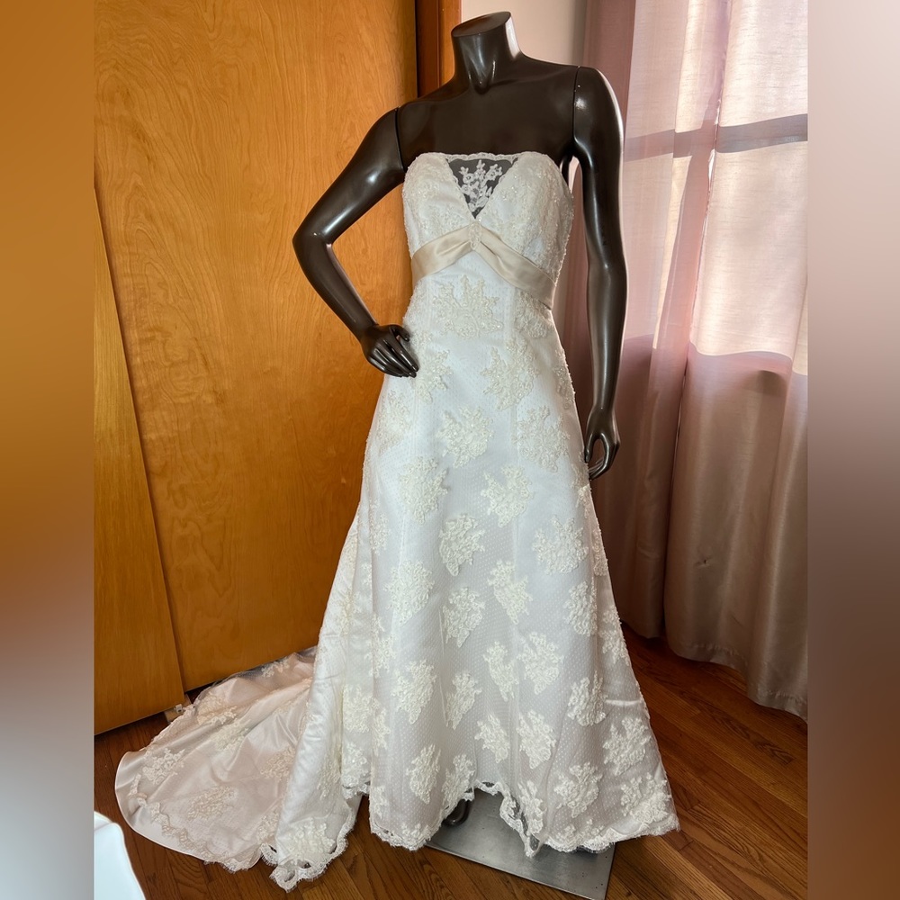 Ivory corset back empire waist with all over lace.